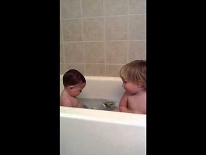 Boys playing in the bath tub
