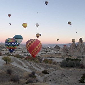 ✨ Cappadocia in Turkey is famous for its unique "fairy chimneys" and stunning hot air balloon rides, offering surreal landscapes and an unforgettable aerial view of the region!  #Cappadocia #FairyChimneys #HotAirBalloons #Turkey | Turkey Art & Architecture | Facebook