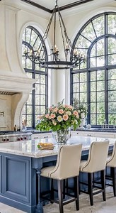 (R) Large kitchen windows maximize natural light, enhance ventilation, and create an airy, open feel that makes spaces feel larger and more connected to the outdoors. They improve aesthetic appeal, offer expansive views, and can increase property value, especially when positioned over sinks or as corner features. #KitchenWindowIdeas #kitchenwindowview #kitchendesign #interiordesign #homedesign | Simply Beautiful Homes & Gardens