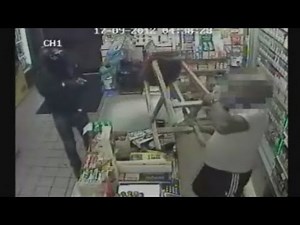 Shopkeeper fights off armed robber with wooden stool in London
