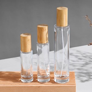 [Hot Item] 30ml 50ml 100ml Round Glass Bottle with Bamboo Cap