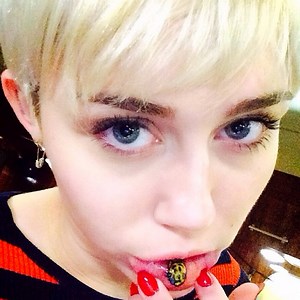 Miley Cyrus Shows Off New "Sad Kitty" Tattoo Inside Her Lip—See the Pics!