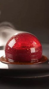 Difficulty ⭐⭐⭐⭐ (ADVANCED) ⏰ Cooking time : 45 min. 🍽️ Category : Dessert 🛒 Ingredients: For the chromaglass outer shell: • 2 cups clear white grape or lychee juice, fully strained • 1/3 cup sugar • 1 tablespoon lemon juice • 1 1/2 teaspoons agar-agar powder • 1 tablespoon glucose syrup or light corn syrup For the ruby flame core: • 1 cup clear juice blend (pomegranate raspberry blood orange), fully strained • 2 tablespoons sugar • 1 teaspoon agar-agar powder • Optional natural food coloring (