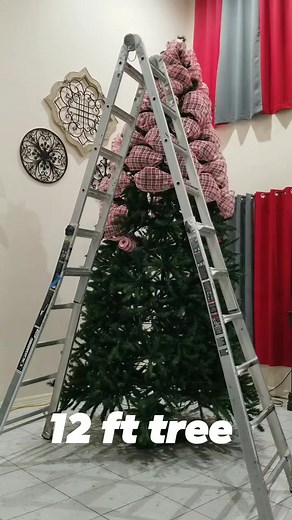 My 12ft Christmas tree in a gingerbread theme. I love this mesh it's a big tree so I need to something to giveM it volume if not it will look naked plus it's more budget friendly. Enjoy. Lots of leg work | Emily's Wreaths & Things Galore