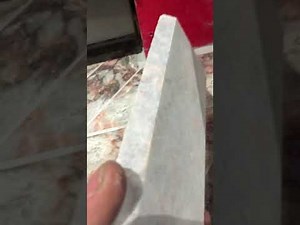 Runtal baseboard heat in the shower marble niche