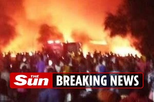 92 dead after tanker collided with bus & 'crowds gathered to collect fuel'