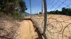 The windmill is a popular tourist attraction for scuba diving, snorkeling, and hiking. However, the hike to the windmill is challenging and not well-maintained. The video shows the hikers struggling to reach the windmill due to fatigue and obstacles such as fences and barbed wires. Despite the challenges, the windmill offers a beautiful view, and the hikers recommend it as a must-see attraction for tourists visiting Parenting Island. #malaysia #perhentianisland #beach | Roman & Fizah | Facebook