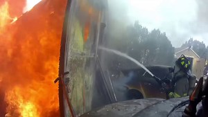 Caught on camera: New video shows moments firefighters begin battling large structure fire