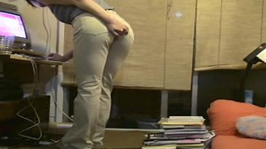 Girl in Grey Top Poop Jeans