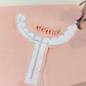 Make this Beautiful Neck Design with Cutwork and Potli Buttons. #neckdesign #kurtineckdesign #sewing #stitching #tailoring #fashiondesigning | Reet Designs