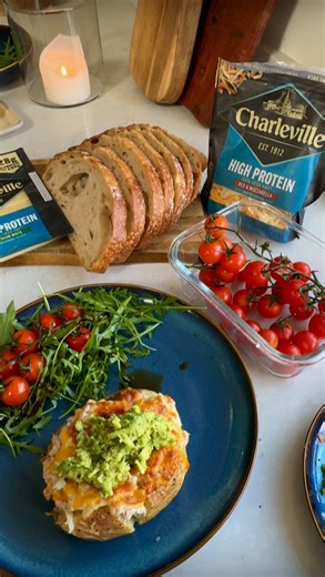 CAROLINE HASSETT on Instagram: "#AD High Protein Jacket Potato ~ perfect post training lunch 👌 Getting in your protein doesn’t have to be hard with @charlevillecheeseire High Protein Cheese. This jacket potato takes just 10 mins start to finish and gets you a mighty 50g of protein INGREDIENTS: 1 large potato Charleville High Protein Grated Cheese 1 tin of tuna (drained) 1 tblsp 0% fat Greek Yogurt Half a small tin of sweetcorn Rocket Cherry tomatoes Avocado Juice half a lime Olive Oil Salt/Pepp