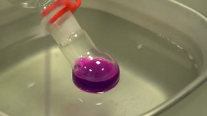 Scientific instrument and equipment rotating flasks, vessel test tubes with liquid organic chemical science for modern scientific research, laboratory detail sample analysis, technology close up