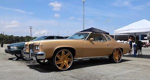 1976 Pontiac Grand Prix Puts on 26-Inch Wheels and Gold Paint, Wants to Be a Donk