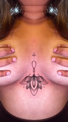 Goa’s premier Tattoo studio| Rk’s ink Xposure on Instagram: "Sternum tattoos are not just ink — they’re attitude. Bold, sexy, and unapologetically powerful, this placement celebrates confidence like no other. A design that flows with her body, sits close to the heart, and speaks volumes without saying a word. For girls who love to own their femininity with strength and style — this one’s a statement. Would you dare to go this bold? 😌 Drop your thoughts in the comments & DM us to book your stern