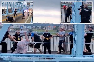 Wild video shows cops beat down anti-ICE protester after demonstration blocks Cincinnati bridge