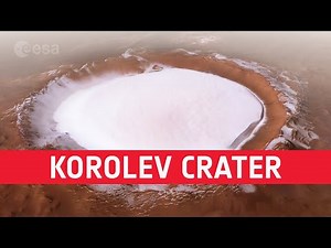 Planet Mars: Flight over Korolev Crater | European Space Agency's Mars Express FriendsofNASA.org: This video, based on images taken by the European Space Agency’s Mars Express, showcases the 82 km wide Korolev crater on Mars. Located in the northern lowlands of the Red Planet, south of the large Olympia Undae dune field that partly surrounds Mars’ north polar cap, this well-preserved impact crater is filled with water ice all year round. The crater’s floor lies two kilometers below its rim, encl
