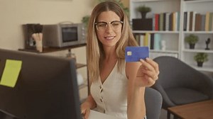 Woman Holding Creditcard Computer Desk Home Stock Footage Video (100% Royalty-free) 3988612759 | Shutterstock
