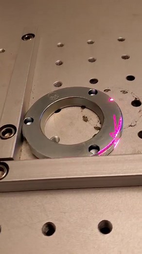 Using our new MOPA fiber laser engraver to make assembly easier by marking the detent flats on our 4140 chromoly spanner nuts with arrows #mopa | Ballistic Fabrication