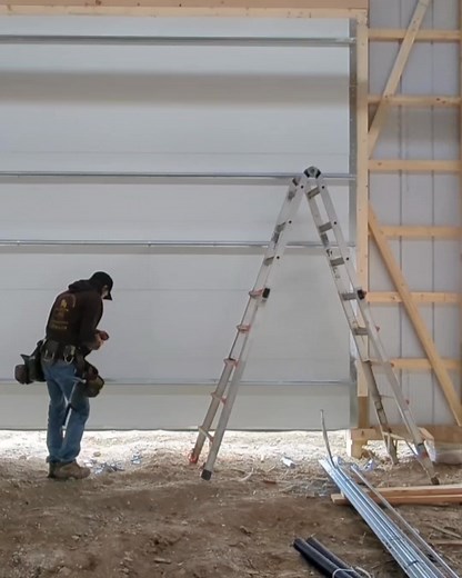 Time lapse of hinge install on a garage door. #construction #postframe #polebarn #yellowstonepostframe #diy #trades | Yellowstone Post Frame LLC