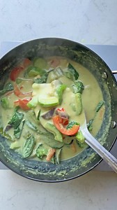Use homemade green curry paste or readymade green curry paste to make this Thai curry in less than 20 minutes. Cook the green curry paste in 1/2 cup coconut milk. Then add kafir lime leaves, vegetables and seasonings, remaining coconut milk, water, and cook until the veggies are tender. Lastly, add basil leaves and cook until they are wilted. Curry is ready. Ingredients: 1 14 oz can unsweetened regular Coconut Milk (approx. 1¾ cup) 2 to 2.5 tablespoons readymade or homemade Thai Green Curry Past