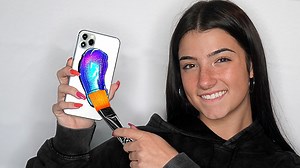 I Surprised Charli D'Amelio With 20 Custom iPhone 11s and her reaction was amazing! Also giving away 3 custom iPhone 11s for you guys! She is currently the most popular influencer on TikTok! | ZHC