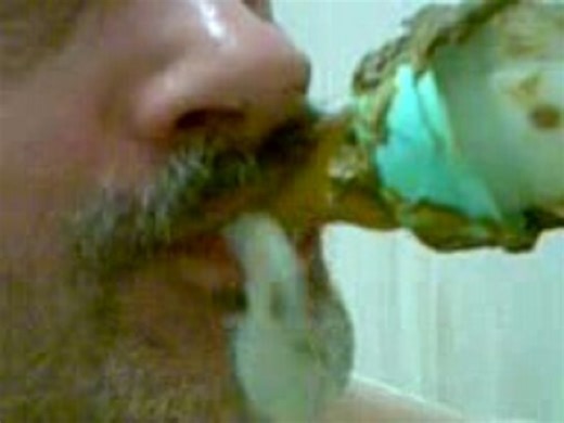 THE BABY SMEARS BABY POO FROM ITS NAPPY