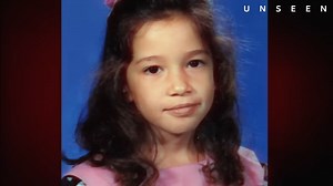 She was tied to a chair. Motionless. Then she blinked