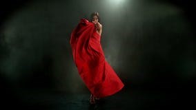 Brunette Woman in Ruby Red Dress Posing Against a Black Background, Captured in Super Slow Motion Stock Video - Video of hair, evening: 392591621