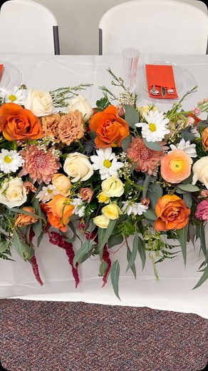 A gorgeous sweetheart table with beautiful pops of color. #weddingflowers #sweethearttable #weddinginspiration #floraldesign #sayido #missouriwedding #missouribride #bridetobe #weddingideasbrides | Sweet Hollow Farm & Floral Design