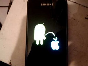 Android peeing on apple.