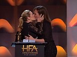 Kate Winslet kisses Allison Janney at the Hollywood Film Awards
