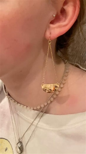 1.2K views · 36 reactions | One of my favorite designs. Stamp a circle, cut it in half, punch holes and hang chain! For these earrings we used gold filled. #jewllerydesign #metalstamping #jewerlymaking | Beaducation.com | Facebook