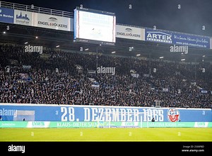 Rostock, Deutschland 22. Dezember 2024: 3. Liga - 2024/2025 - FC Hansa Rostock vs. Hannover 96 II Im Bild: 28. Dezember 1965 steht auf einem Banner vor der Südtribüne, Gründungstag Hansa Rostock /// DFB regulations prohibit any use of photographs as image sequences and/or quasi-video Stock Photo - Alamy