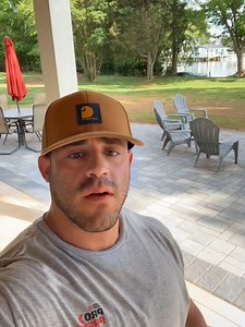 Beautiful walkway to paver patio pad with a flagstone outdoor shower area | Andrew’s Lawn & Landscaping