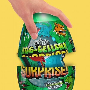 SPOILER ALERT 🚨 Our Egg-cellent surprise is back for Christmas 🎄 Comes with a wallet, sticky hand, slapband, squishie, fluffy sand and keyring 🦖 Shop the Egg-cellent surprise in stores or online here for AU 👉https://bit.ly/35FOwty Or here for NZ 👉https://bit.ly/34zQTyD | Smiggle