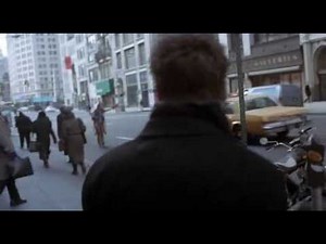 Actress wearing brown leather pants