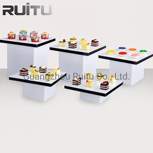 [Hot Item] Wedding Party Banquet Setup Decorative Tabletop Food Cake Display Serving Set White Square Cupcake Dessert Buffet Display Racks Stand Acrylic Buffet Riser Stand