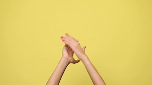 Two Arms Clapping Loudly Against Yellow: стоковое видео (без лицензионных платежей), 1059706835 | Shutterstock