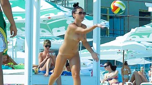 Volleyball with beautiful nude beach girl caught on a