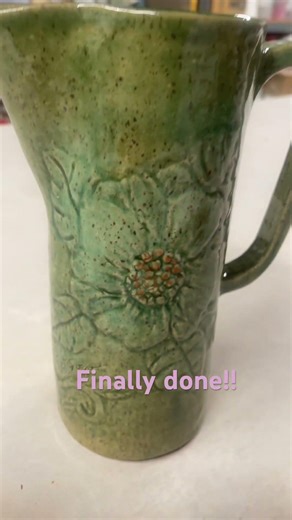 Ceramic slab rolled pitcher with hand carved flowers. #pottery #ceramicart #ceramic #potteryart #art