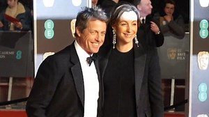 Hugh Grant and his girlfriend Anna look chic in head-to-toe black