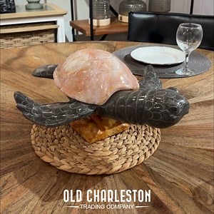 Oceanic Elegance 🐢✨ Meet Fred the marble sea turtle that's making waves! Hand-carved with precision and care, this beautiful sculpture is more than just decor – it's a statement piece. Bring the tranquility of the ocean into your home with this elegant creation. | Old Charleston Trading Company