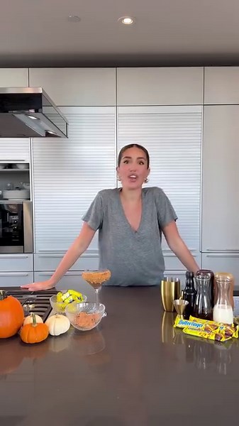 Cheers to shaking things up this Halloween! Introducing the Butterfinger-tini: the first-ever, Tinx-approved Butterfinger inspired cocktail rimmed with Butterfinger bits. Must be 21 and drink responsibly. 🍸 | Butterfinger