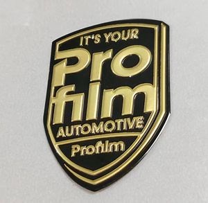 [Hot Item] Factory Custom Decor Plastic Gold Sticker 3D Brand Logo Label Soft-Plastic Badge