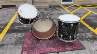 Late 50s transition era "Buddy Rich" outfit from WFL in a beautiful Black Pearl. Beautiful mahogany shells, chrome hardware, no original holes. One missing shell mount cymbal holder two tom hoops and on bass drum hoop are not original. In store and at davesdrumshop.com #wfl #ludwigdrums #1950s #blackdiamondpearl #vintagedrums #buddyrich #drums #drumsdrumsdrums #drumshop #ottawa #canada | Dave's Drum Shop