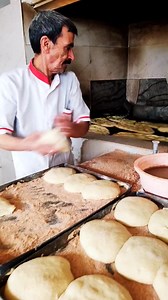 5.2K views · 19 reactions | Amazing ancient bread making in the oven right now 稜 #foodie #breadmaking #artisanbaking #bakingprocess #tandoor #freshbread | This Bakery I | Facebook