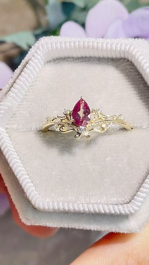 Lotus ring customized with a beautiful color-changing alexandrite stone #delicatejewelry #delicaterings #daintyring #daintyjewelry #alexandritering #alexandrite | Azura Jewelry