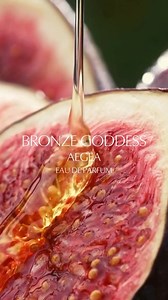 NEW Bronze Goddess Aegea has landed ✈️ Glow anywhere with our new limited-edition eau de parfum, inspired by the hillside villages and sun-kissed beaches of Mykonos. Pink bougainvillea, fig nectar and a light mist of coconut milk combine to create the scent of summer. Shop exclusively at esteelauder.co.uk and @bootsuk #BronzeGoddess #GlowAnywhere Video description: honey oozes down a freshly cut fig, followed by clips of pink bougainvillea flowers, coconut, beaches, sea-soaked hair, lemon trees 