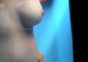 Beach Cabin Changing 2 - watch on VoyeurHit.com. The world of free voyeur video, spy video and hidden cameras