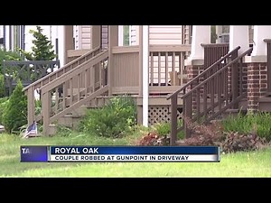 Royal Oak couple robbed at gunpoint in their driveway